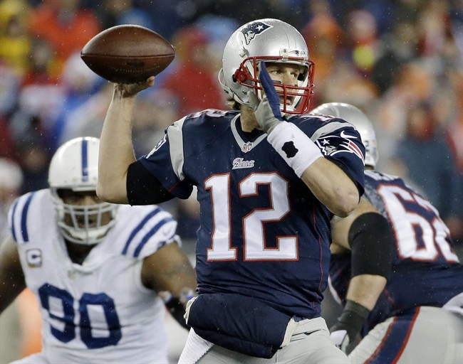 New England Patriots quarterback Tom Brady looks to pass during the first half of the NFL football AFC Championship game against the Indianapolis Colts in Foxborough, Mass. on Jan. 18, 2015.