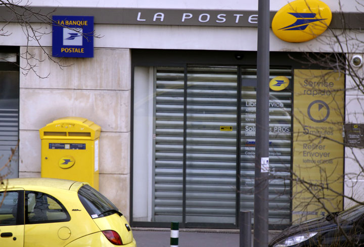 Picture taken of the post office where an armed man is holed up with two hostages, on January 16, 2015 in Colombes, outside Paris, though there is no known link with last week's jihadist attacks. Police cordoned off the area in Colombes, a city northwest of Paris, and a helicopter was flying overhead.