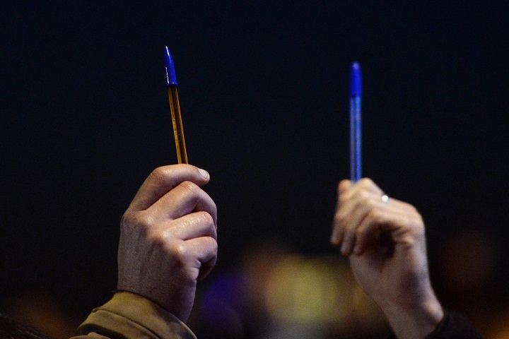 People hold pens in Marseille, southern France, on January 7, 2015, as they take part in a gathering following an attack by unknown gunmen on the offices in Paris of satirical weekly Charlie Hebdo.