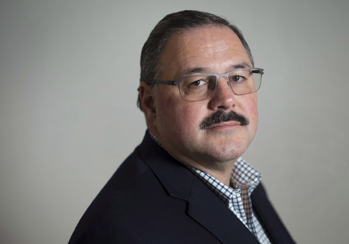 Ronald Boire, acting CEO of Sears Canada, poses at the company's headquarters in Toronto on Wednesday, November 12, 2014. 