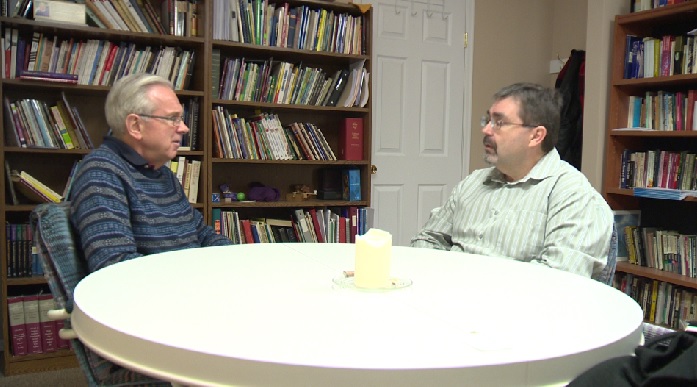 David Sparks (left) and Armound Houle (right) discussing how to help a refugee family coming to Summerland.