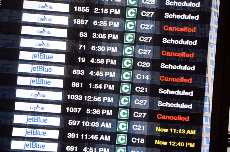 The flight board at Logan International Airport shows cancellations ahead of a massive winter storm January 26, 2015 in Boston, Massachusetts.
