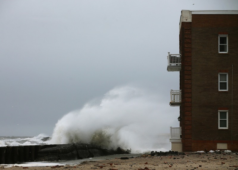 Heavy surf pounds the shoreline where a boardwalk once stood before it was damaged by Hurricane Sandy, on January 26, 2015 in Atlantic City, NJ. Much of the Northeast is bracing for a major winter storm which is expected to bring blizzard conditions and 10 to 30 inches of snow in some areas.