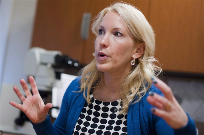 Dr. Anny Sauvageau is shown in her Edmonton office on Friday, June 21, 2011. Sauvageau, Alberta's former chief medical examiner, is suing the province, claiming political interference in her job and overpayment to funeral homes.