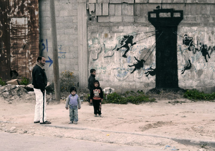 Photograph of Banksy’s street art in the Gaza Strip.