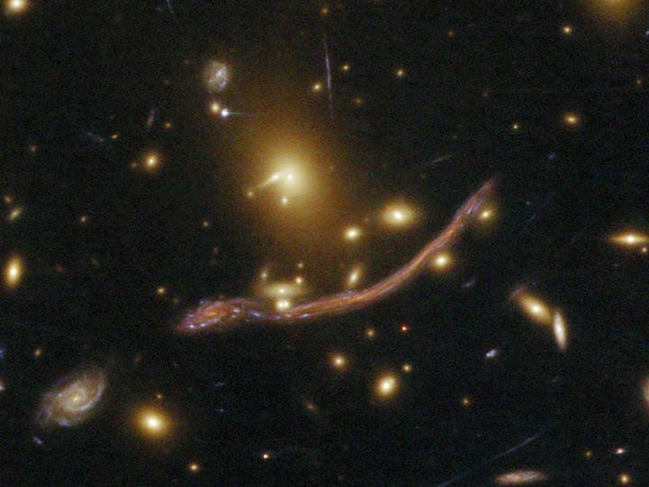 This image, taken by Hubble in 2009, shows another effect of gravitational lensing.