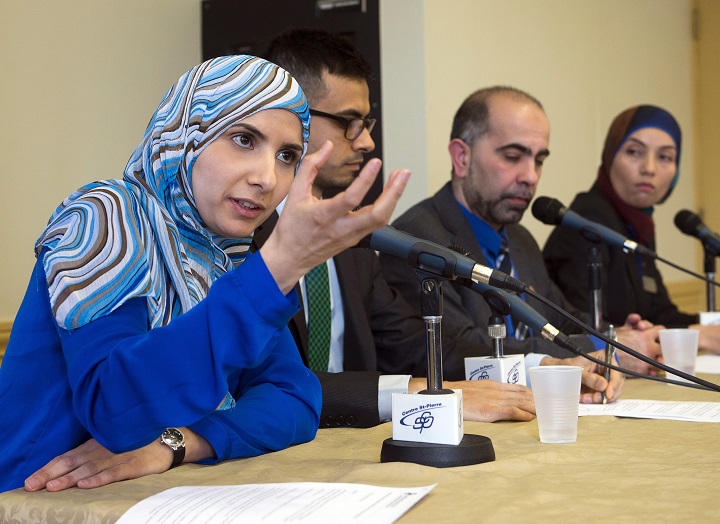 Vice-president of the Canadian Muslim Forum, Kathy Malas, left to right, speaks to reporters as Sameer Zuberi, Samer Majzoub, and Samah Jabbar look on at a news conference in Montreal on Friday, February 20, 2015.