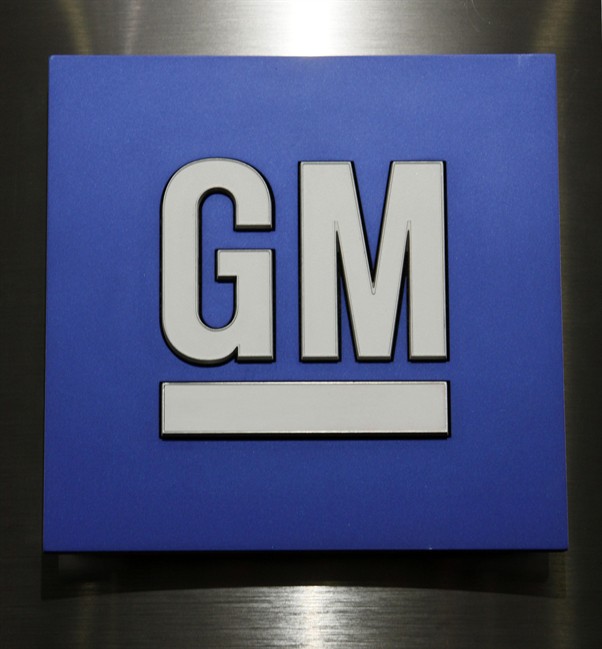 This Jan. 25, 2010, file photo, shows a General Motors Co. logo during a news conference in Detroit.