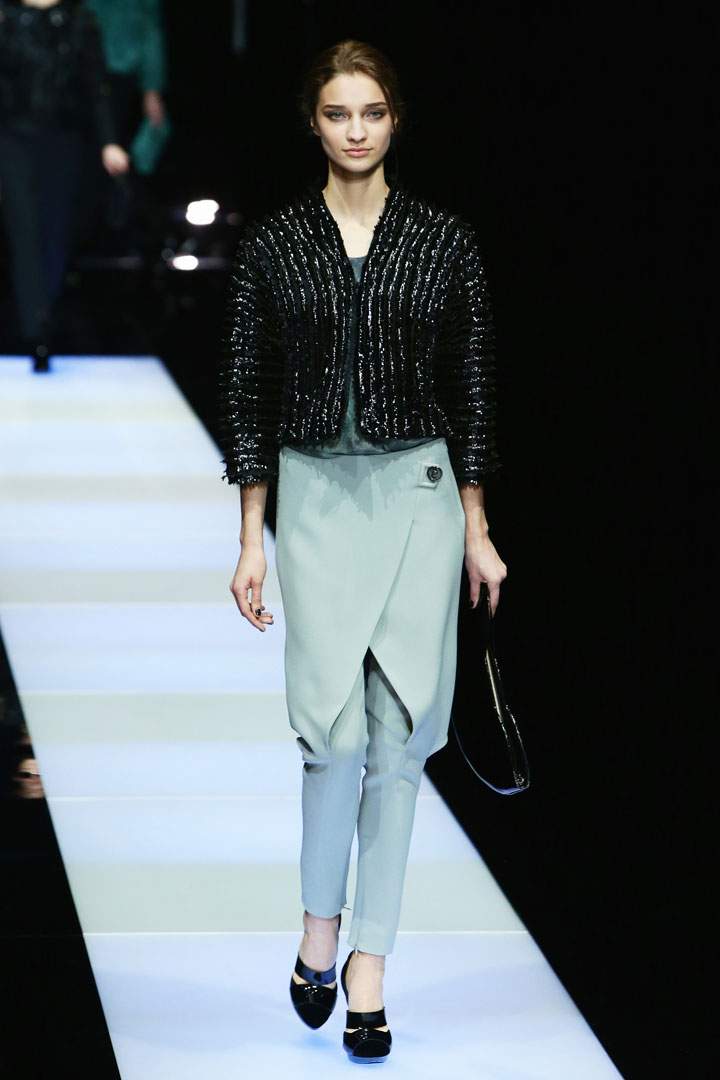 A model walks the runway at the Giorgio Armani show during the Milan Fashion Week Autumn/Winter 2015 on March 2, 2015 in Milan, Italy.