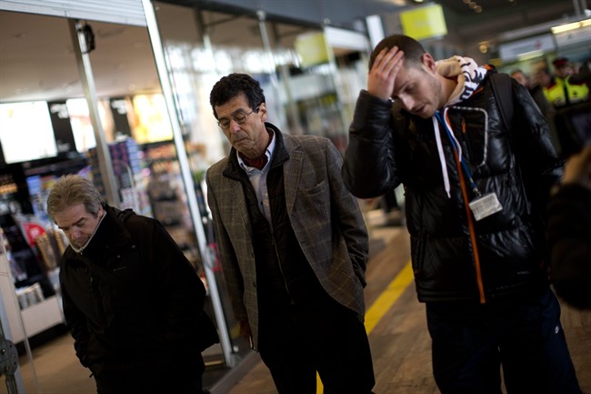 A family of people involved in a crashed plane arrives at the Barcelona airport in Spain