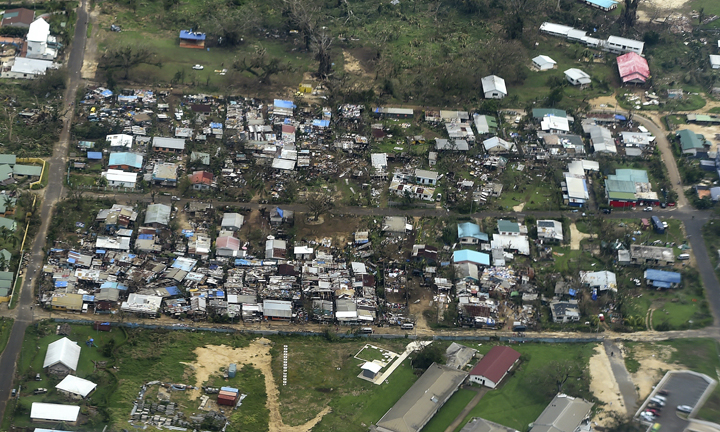 Damage to houses in Port Vila, Vanuatu is seen from the air in the aftermath of Cyclone Pam Monday, March 16, 2015.