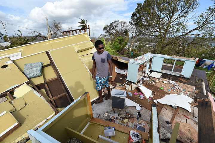 Adrian Banga surveys his destroyed house on March 16, 2015 in Port Vila, Vanuatu.