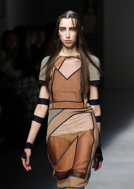 A model wears a creation for Masha Ma's fall-winter 2015-2016 ready to wear fashion collection, presented at Paris fashion week, Paris, France, Wednesday, March 11, 2015.