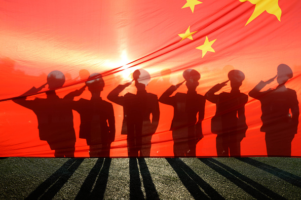 China building airstrip in contested South China Sea: report - image