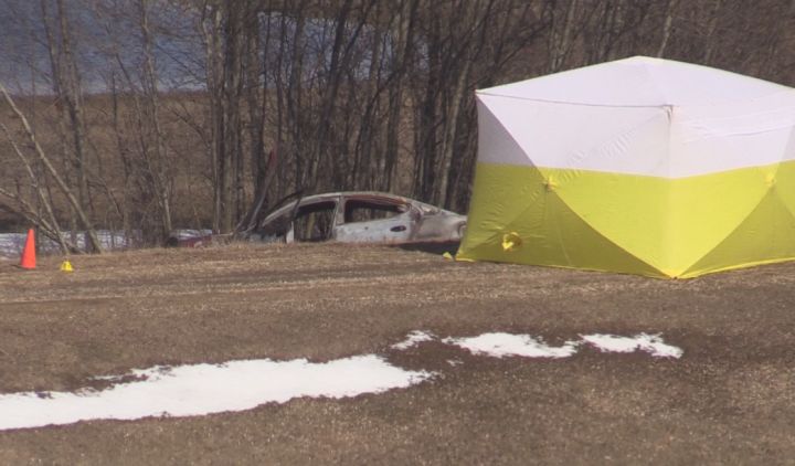 The RCMP Major Crimes Unit investigates after person found dead inside vehicle west of Stony Plain Friday, April 3, 2015.
