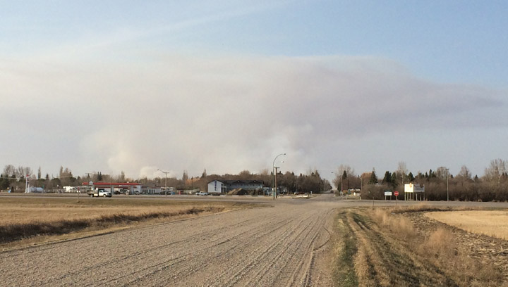 Six fire departments battle through the night to bring a grass fire near Borden, Sask. under control.