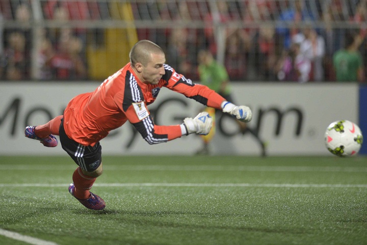 Impact of Montreal Goal Keeper Evan Bush defends against Liga Deportiva Alajuelense during their Concacaf Champions League semifinal match in Alejandro Morera Soto stadium in Alajuela, 25km northwest of San Jose on April 7, 2015.