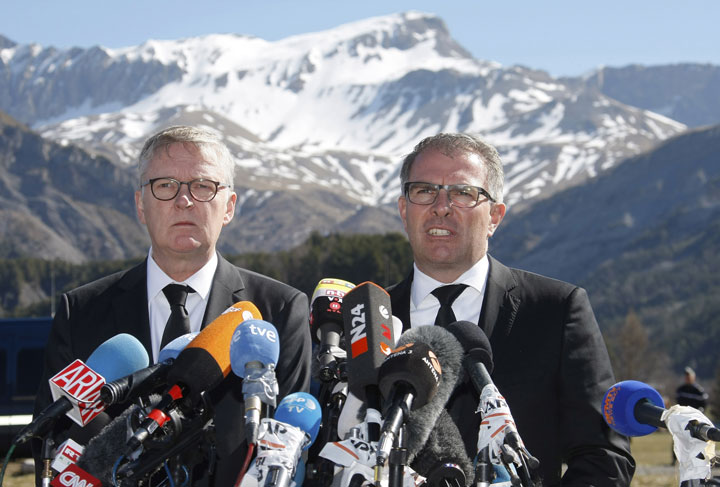 CEO of Germanwings Thomas Winkelmann, left, and Lufthansa CEO Carsten Spohr answer reporters near the site of the Germanwings crash, in Le Vernet, France, Wednesday, April 1, 2015.