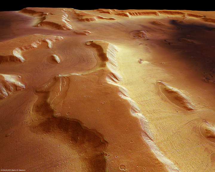 The image from the High Resolution Stereo Camera shows that a thick layer of dust covers the glaciers, so they appear as the surface of the ground, but radar measurements show that there are glaciers composed of frozen water underneath the dust.