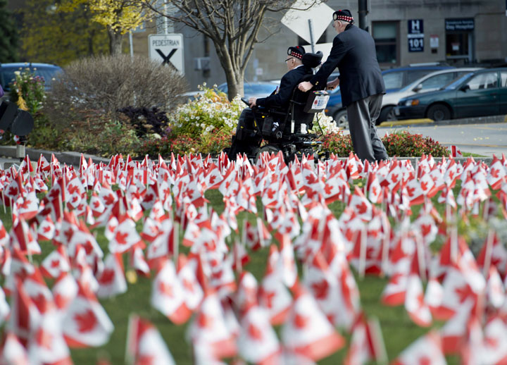 Veterans leave the Remembrance Day ceremony at the Sunnybrook Veterans Residence in Toronto on Tuesday, November 11, 2014. 