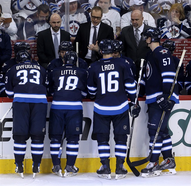 Winnipeg Jets head coach Paul Maurice instructs the team during a timeout while playing against the Anaheim Ducks during the third period of game three.