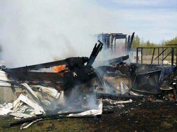 House explosion and fire at home on Paul Band, May 11, 2015.