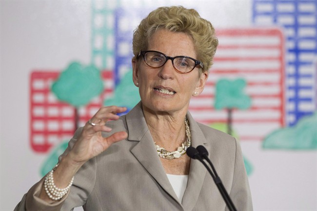 Ontario Premier Katholeen Wynne is shown addressing the media in Toronto on Monday, April 13 2015. 