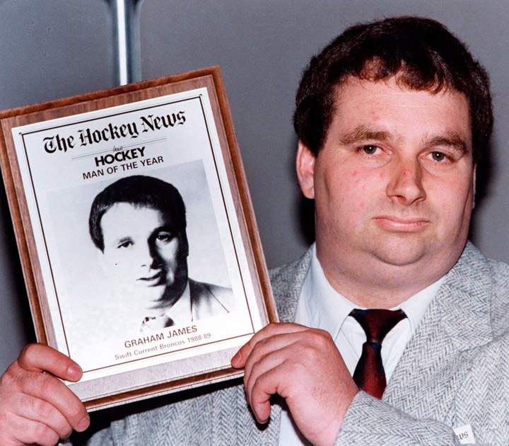 Graham James holds his Hockey News award in Toronto, June 8, 1989. The Hockey News says twice-convicted pedophile Graham James has returned a plaque the magazine gave him in his heyday as a junior coach.