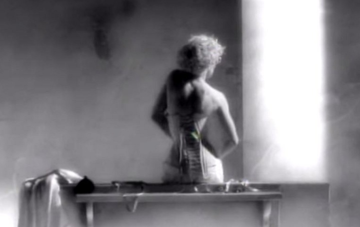A still from Madonna’s “Vogue” video, inspired by Horst’s Mainbocher Corset.