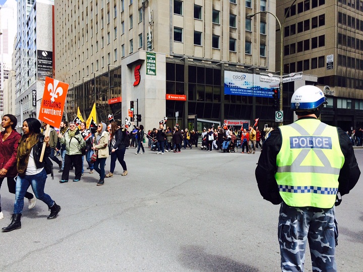 Thousands of demonstrators have taken to the streets of Montreal and elsewhere in the province to mark International Workers Day on May 1, 2015.