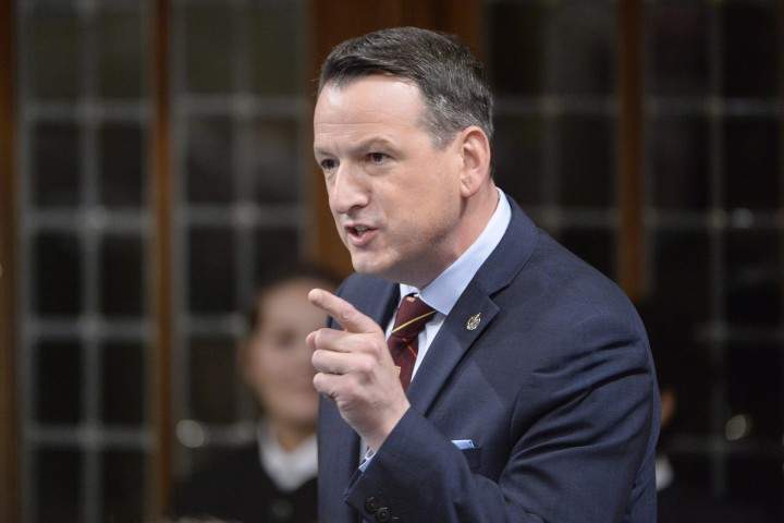 Natural Resources Minister Greg Rickford answers a question during Question Period in the House of Commons in Ottawa on Thursday, Feb. 26, 2015.