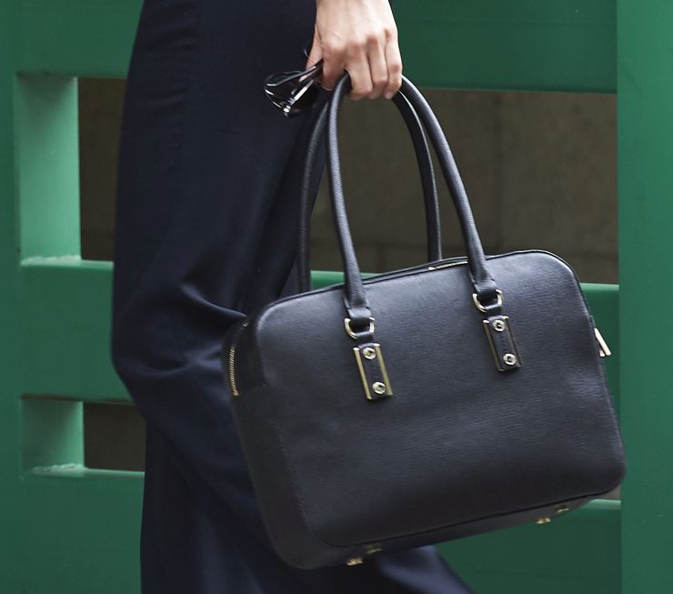 Your bag might be causing you back problems.