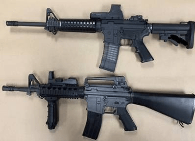 Side by side: Top rifle is a WVPD Colt C8 Patrol Carbine.Bottom rifle is the BB rifle seized.