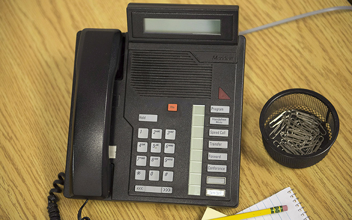 A telephone sits on a desk in a Toronto office on Friday May 16, 2014. The Federal Court of Appeal tossed out abid to overturn the federal election results from a Guelph, Ont. courtroom.