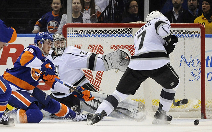 Los Angeles Kings goalie Jonathan Quick (32) and defenseman Andrej Sekera (7) during the first period of an NHL hockey game on Thursday, March 26, 2015, in Uniondale, N.Y. The Edmonton Oilers signed Sekera for six years at $33 million.