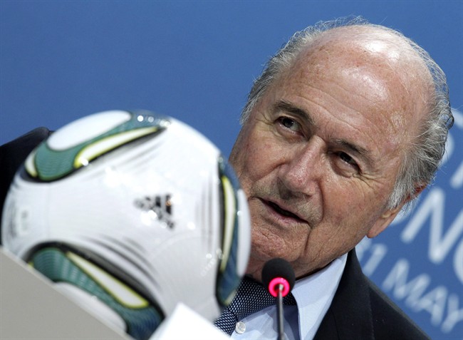 File- This June 1, 2011, Swiss FIFA President Joseph (Sepp) Blatter speaks during a press conference after the 61st FIFA Congress in Zurich, Switzerland. 