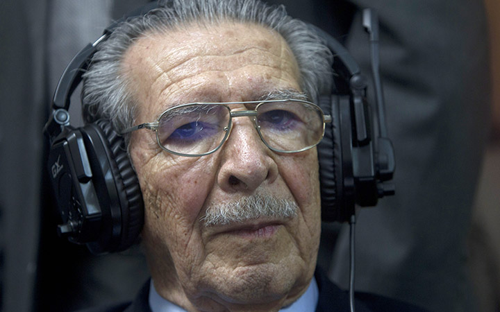 Guatemala's former dictator Jose Efrain Rios Montt wears headphones as he listens to the verdict in his genocide trial in Guatemala City on May 10, 2013. Prosecutors say Rios Montt is responsible for the deaths of almost 2,000 Mayan Indians, killed by the army between 1982 and 1983.
