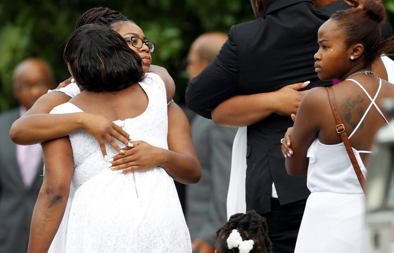 Mourners arrive to mourn the death of Sandra Bland at the DuPage African Methodist Episcopal Church Saturday, July 25, 2015, in Lisle, Ill.