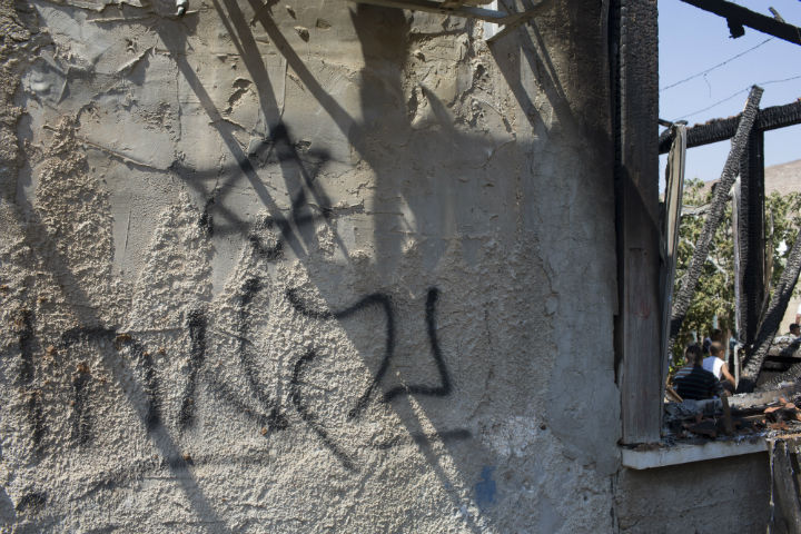 A house fire in the Palestinian village of Duma, West Bank, suspected to have been set by Jewish extremists, killed an 18-month-old Palestinian child, injured both parents and his four-year-old brother.