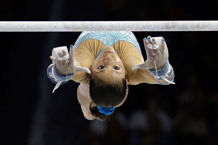Venezuela’s Jessica Lopez performs during the women’s artistic gymnastics uneven bars competition in the Pan Am Games in Toronto, Tuesday, July 14, 2015.