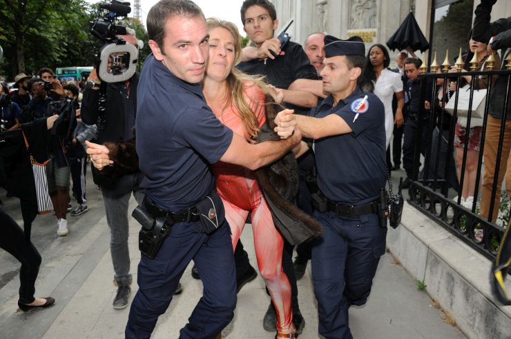 Peta’s activist trying to disturb Fendi’s Fall-Winter 2015/2016 Haute Couture collection show held at Theatre des Champs Elysees in Paris, France on July 8, 2015.