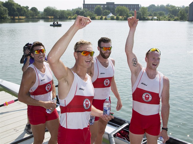 Canada’s (left to right) Tim Schrijver, Kai Langerfeld, Conlin McCabe, and Will Crothers waves to fans after winning gold in the the men’s coxless four final at the 2015 Pan Am Games at the Royal Canadian Henley Rowing Course in St.Catharines, Ont. on Monday, July 13, 2015.
