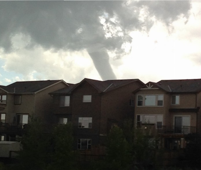 Photo of a funnel cloud near Aspen Woods Calgary.