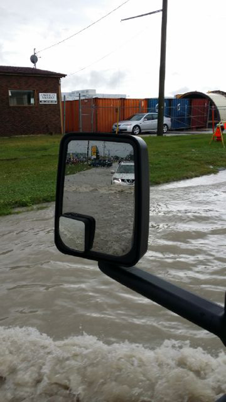 Winnipeg flood rain Manitoba storm Chevrier Trottier