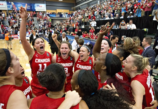 Canada celebrates their win over Cuba during second half action of the 2015 FIBA Americas Women's Championship Final in Edmonton on August 16, 2015. Saskatchewan Huskies women’s basketball team coach Lisa Thomaidis has had a golden summer as bench boss of national team.