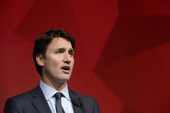 Liberal Leader Justin Trudeau speaks to supporters as he attends a gala in Toronto Thursday, August 27, 2015. THE CANADIAN PRESS/Paul Chiasson