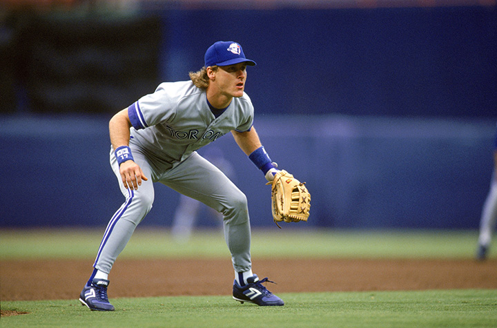 Kelly Gruber readies for a play during a game against the California Angels at Anaheim Stadium on May 10, 1992 in California.