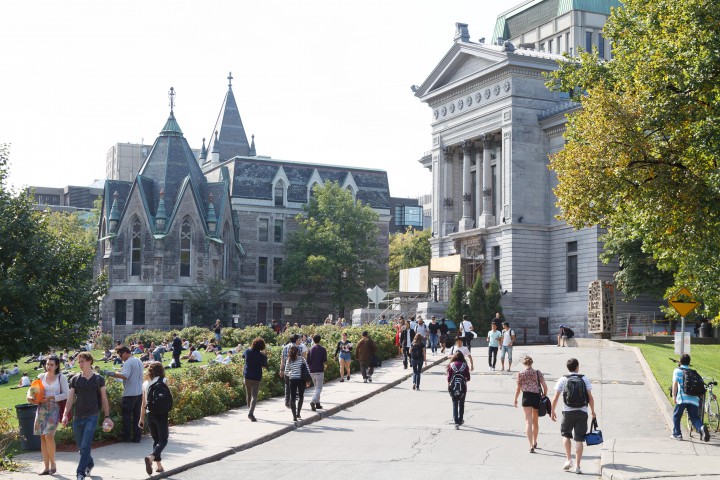 McGill entrance gate with students, Wednesday, August 19, 2015.