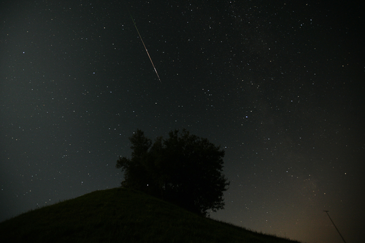 A meteor streaks across the sky in a file photo.