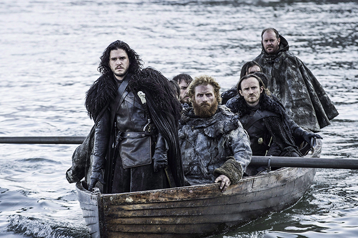 This image released by HBO shows Kit Harington as Jon Snow, left, in a scene from "Game of Thrones." There are a mountain of "Game of Thrones" Emmy nominations this year, and among them, a cadre of Canadian contenders. 